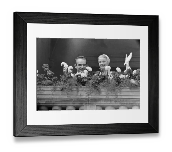 Framed Print : The marriage of Grace Kelly to Prince Rainier III, pictured on a balcony. 18th April 1956 Framed Print : The marriage of Grace Kelly to Prince Rainier III, pictured on a balcony. 18th April 1956