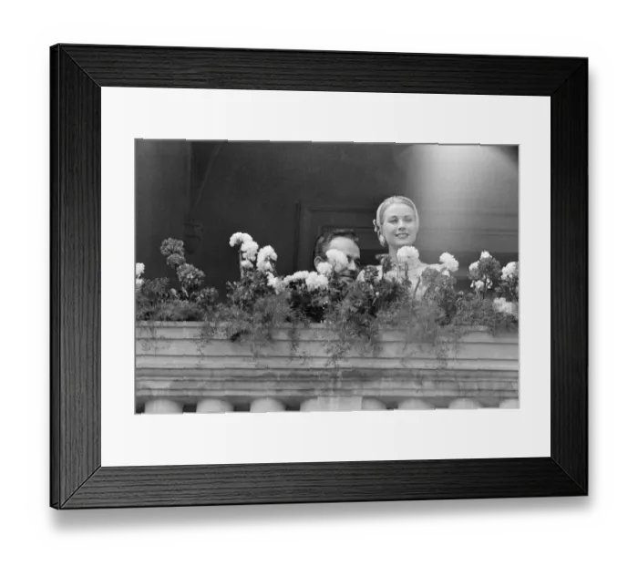 Framed Print : The marriage of Grace Kelly to Prince Rainier III, pictured on a balcony. 18th April 1956 Framed Print : The marriage of Grace Kelly to Prince Rainier III, pictured on a balcony. 18th April 1956