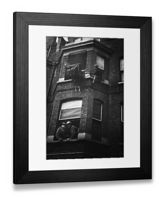 Framed Print : Fire crews, police and ARP wardens help salvage furniture from properties close to