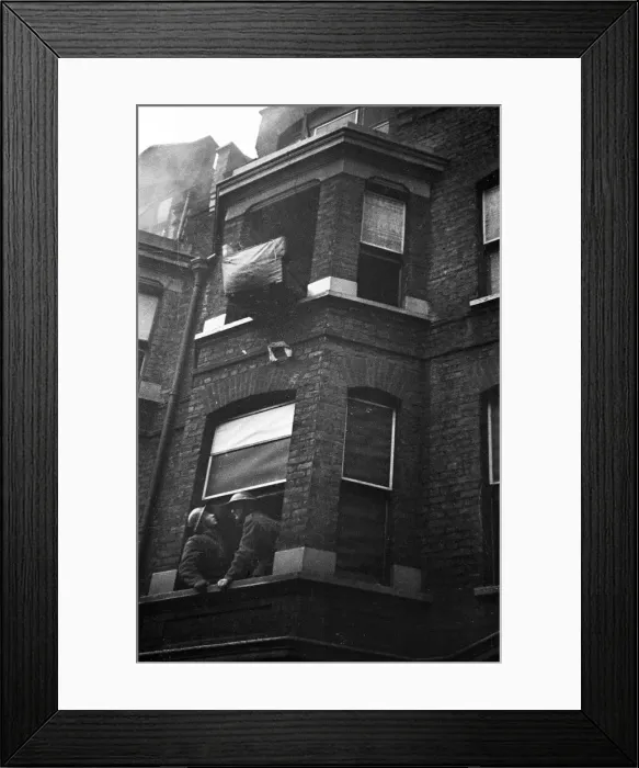 Framed Print : Fire crews, police and ARP wardens help salvage furniture from properties close to Framed Print : Fire crews, police and ARP wardens help salvage furniture from properties close to