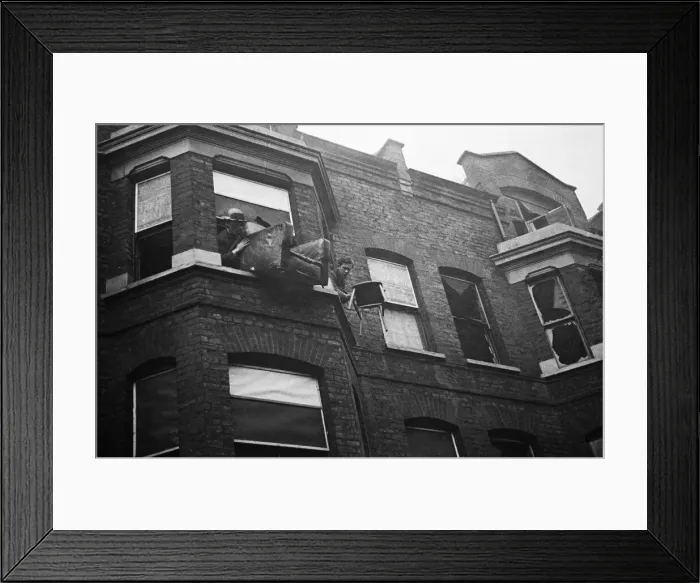 Framed Print : Fire crews, police and ARP wardens help salvage furniture from properties close to