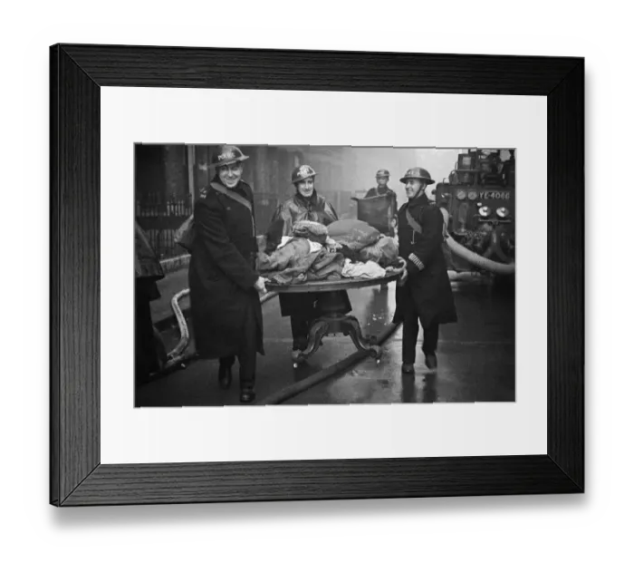 Framed Print : Fire crews, police and ARP wardens help salvage furniture from properties close to Framed Print : Fire crews, police and ARP wardens help salvage furniture from properties close to