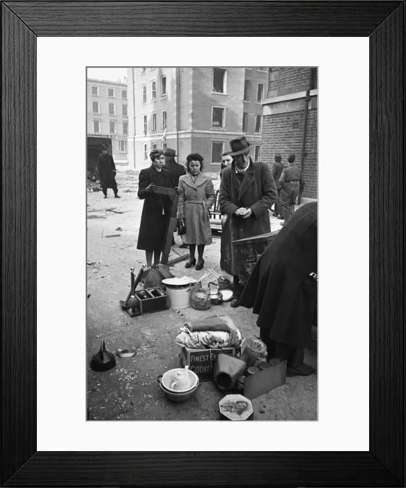 Framed Print : Chelsea residents with the few belonging salvaged from their bombed out following a raid