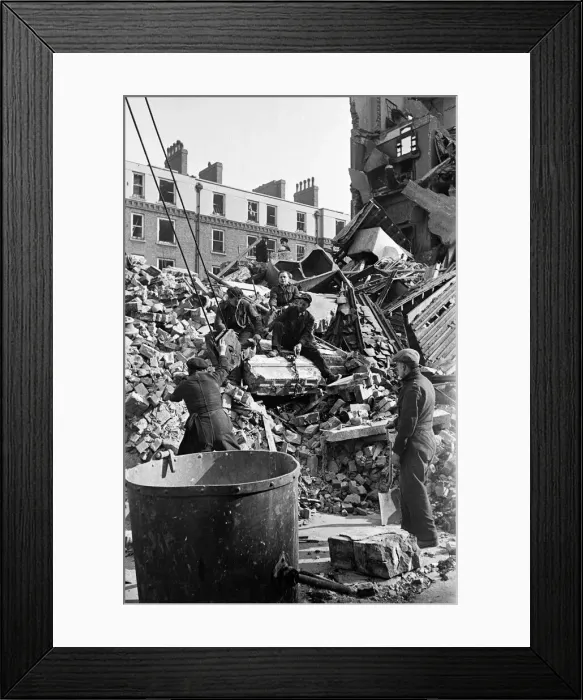 Framed Print : Members of the National Fire Service (NFS ) and heavy rescue help lift Framed Print : Members of the National Fire Service (NFS ) and heavy rescue help lift