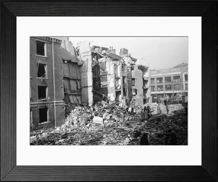 Framed Print : Chelsea residents with the few belonging salvaged from their bombed out following a raid