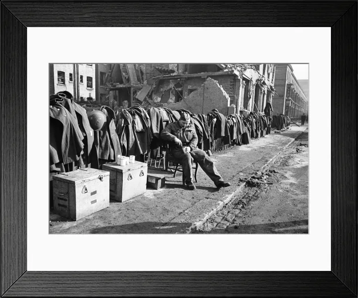 Framed Print : Soldiers discarded tunics and coats as they help with the clean up of Chelsea following Framed Print : Soldiers discarded tunics and coats as they help with the clean up of Chelsea following
