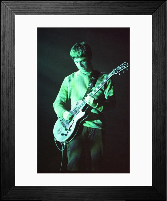 Framed Print : Noel Gallagher of Oasis performing at Newcastle Arena during their Be Here Now Tour Framed Print : Noel Gallagher of Oasis performing at Newcastle Arena during their Be Here Now Tour