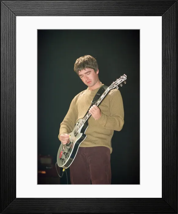 Framed Print : Noel Gallagher of Oasis performing at Newcastle Arena during their Be Here Now Tour Framed Print : Noel Gallagher of Oasis performing at Newcastle Arena during their Be Here Now Tour