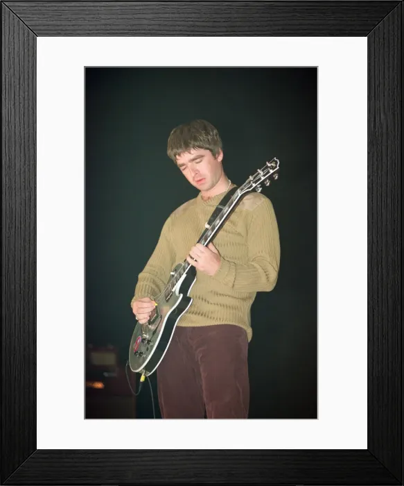 Framed Print : Noel Gallagher of Oasis performing at Newcastle Arena during their Be Here Now Tour Framed Print : Noel Gallagher of Oasis performing at Newcastle Arena during their Be Here Now Tour