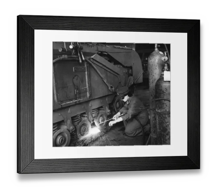 Framed Print : Private Mary Lynn wielding a Churchill tank in an Ordnance Depot Framed Print : Private Mary Lynn wielding a Churchill tank in an Ordnance Depot