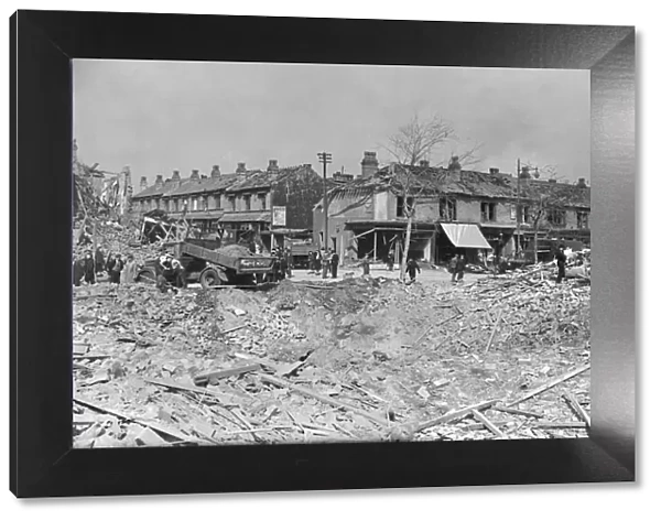 Workmen clearing the rubble at Rookery Road, Handsworth