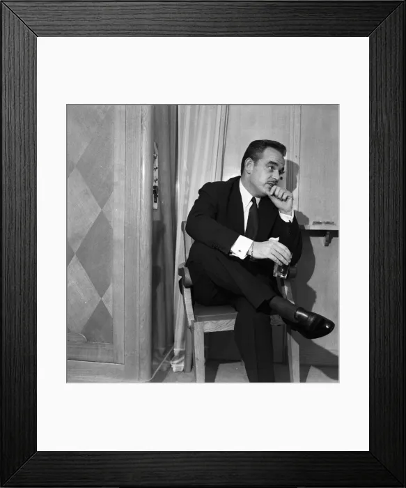 Framed Print : Prince Rainier of Monaco in his suite aboard the ile de France. 22nd March 1956 Framed Print : Prince Rainier of Monaco in his suite aboard the ile de France. 22nd March 1956