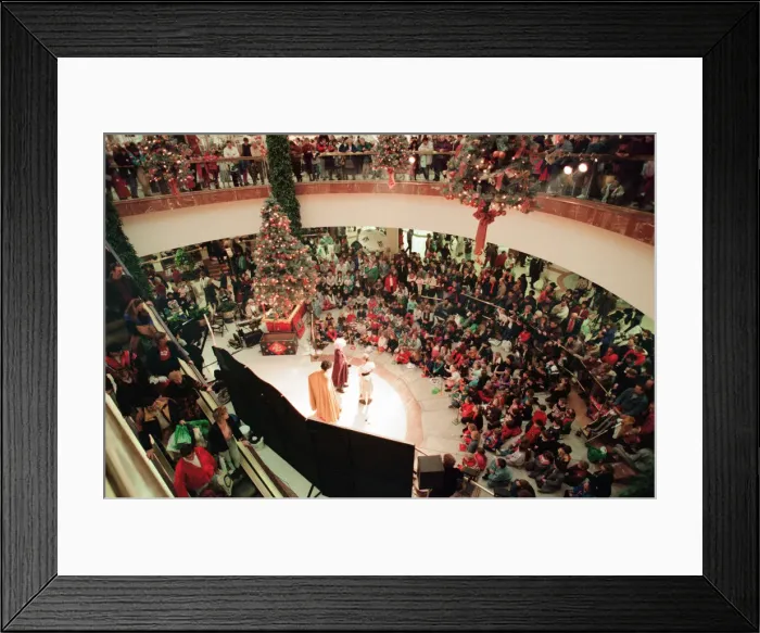 Framed Print : Customers pack Merry Hill Shopping Centre in Brierley Hill, first day of Christmas Sales