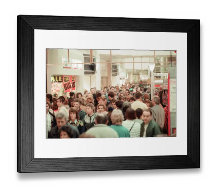 Framed Print : Customers pack Merry Hill Shopping Centre in Brierley Hill, first day of Christmas Sales