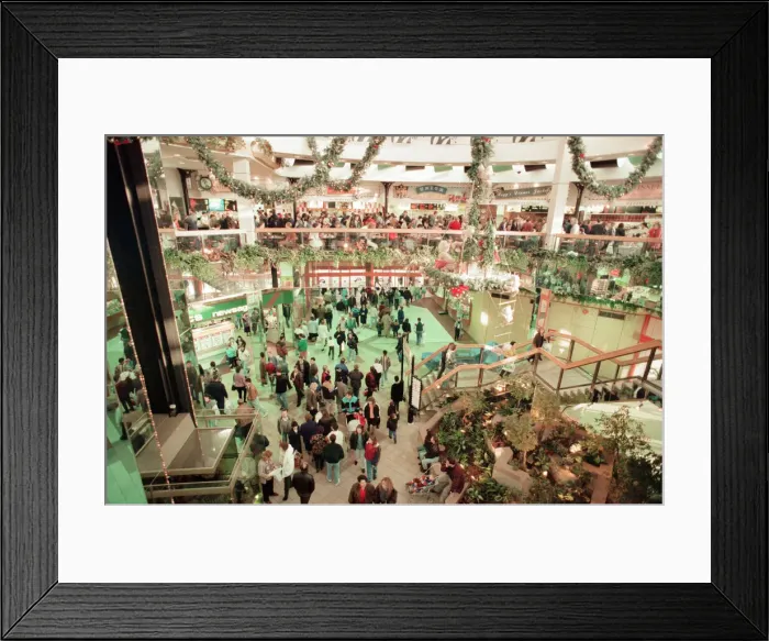 Framed Print : Customers pack Merry Hill Shopping Centre in Brierley Hill, first day of Christmas Sales