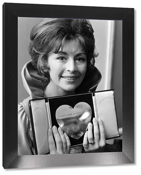 Actress Nanette Newman with her award for Variety Club of Great Britain film actress of