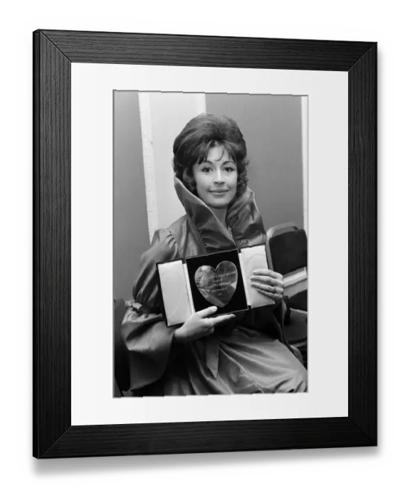 Framed Print : Actress Nanette Newman with her award for Variety Club of Great Britain film actress of
