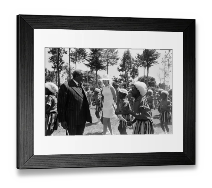 Framed Print : Princess Anne watches a traditional dance of welcome alongside the President of Kenya