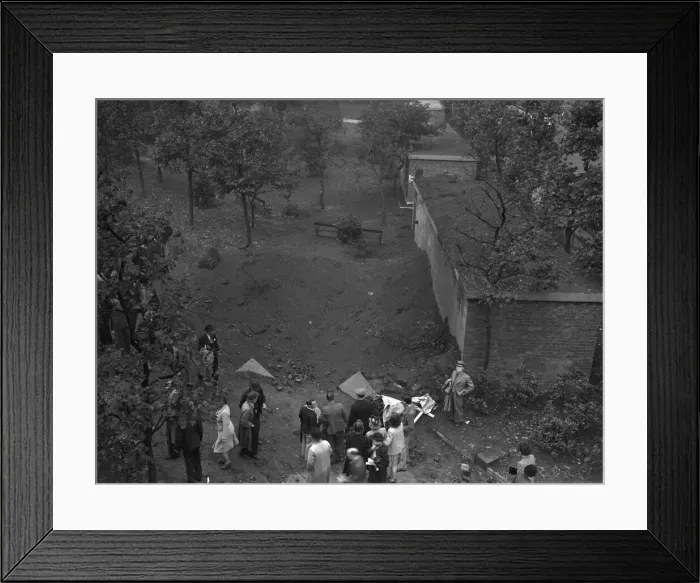 Framed Print : Crater next to a public surface air raid shelter in St Phillips Churchyard Framed Print : Crater next to a public surface air raid shelter in St Phillips Churchyard