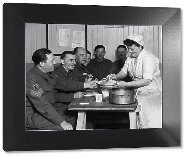 Home Guard enjoying a meal at a Wallasey anti aircraft battery site on the Home Front