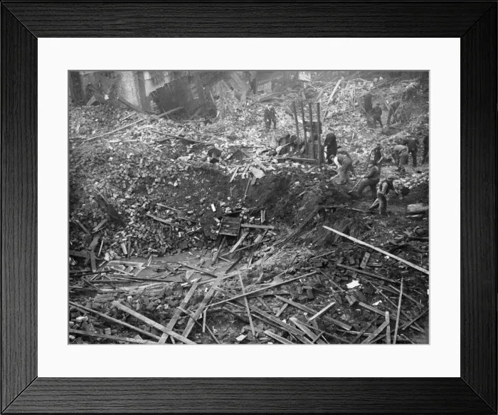 Framed Print : The crater left by an enemy bomb in Christian Street, Liverpool after a heavy air raid by Framed Print : The crater left by an enemy bomb in Christian Street, Liverpool after a heavy air raid by