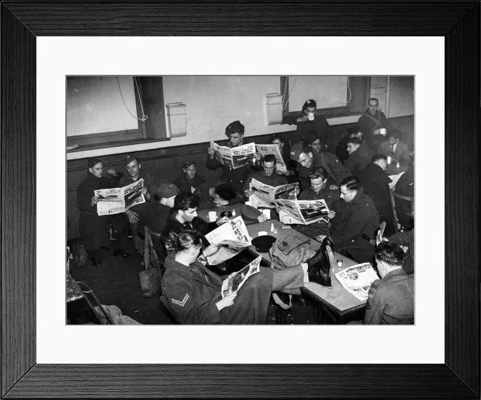 Framed Print : Soldiers reading the Sunday Pictorial. April 1943 Framed Print : Soldiers reading the Sunday Pictorial. April 1943