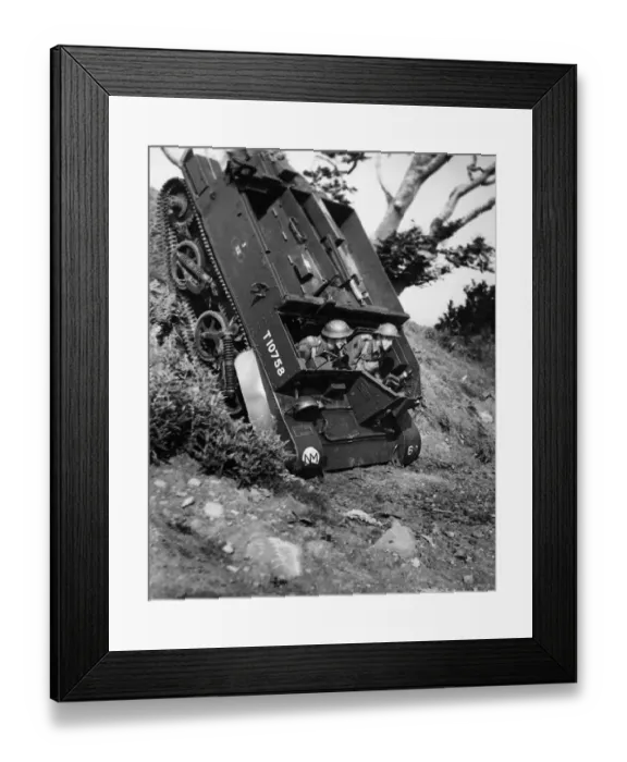 Framed Print : A Bren Gun Carrier makes an almost vertical drop down a hazardous spot during British