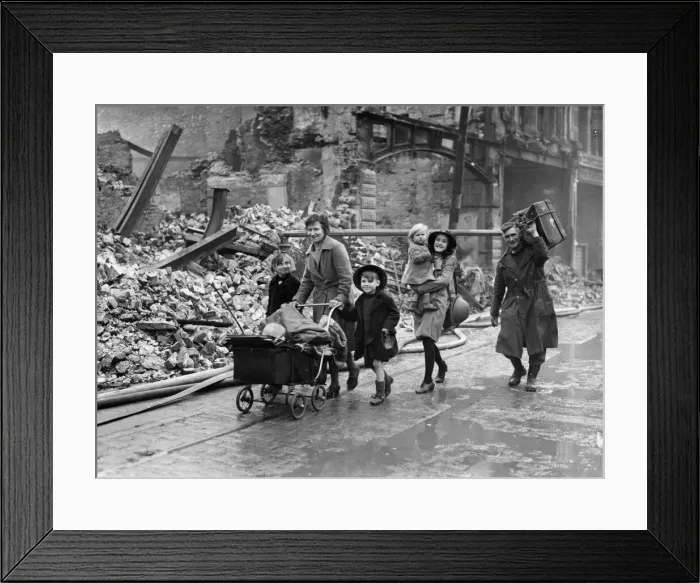 Framed Print : Mr C. E. Mill and family passing through the devastated streets of residential Plymouth Framed Print : Mr C. E. Mill and family passing through the devastated streets of residential Plymouth