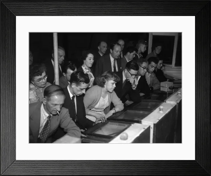 Framed Print : People playing the Twenty One Game in a Sixpenny Casino stall in Blackpool