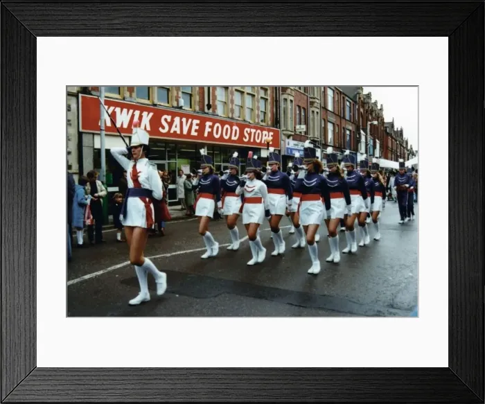 Framed Print : A smartly dressed marching band heads a parade along Station Road, Port Talbot, 1982 Framed Print : A smartly dressed marching band heads a parade along Station Road, Port Talbot, 1982