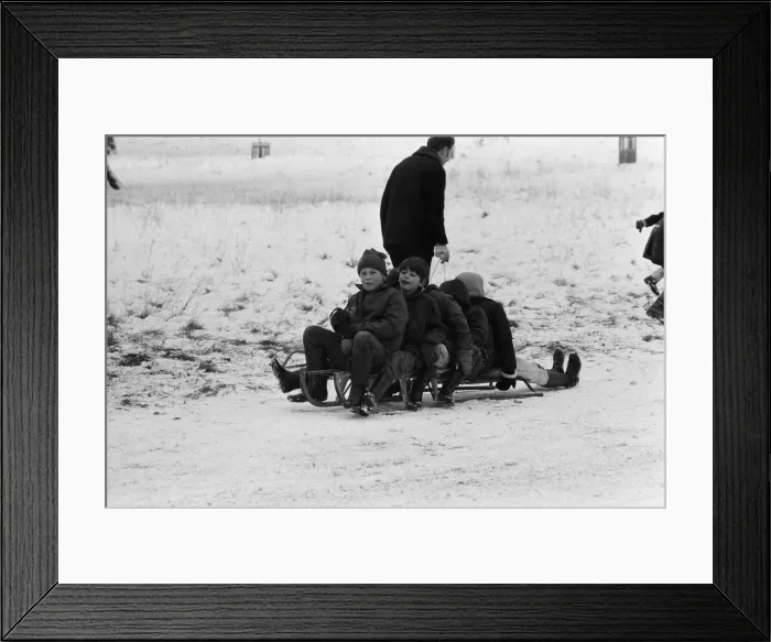 Framed Print : General views of tobogganing and skiing in Richmond Park, London. 27th December 1970 Framed Print : General views of tobogganing and skiing in Richmond Park, London. 27th December 1970