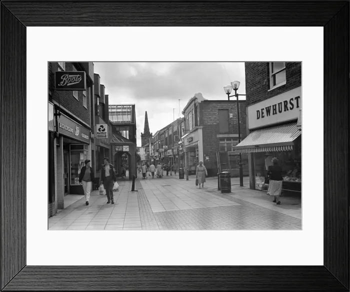 Framed Print : Eccleston Street Prescot, Merseyside, which has seen the arrival of a new shopping mall Framed Print : Eccleston Street Prescot, Merseyside, which has seen the arrival of a new shopping mall