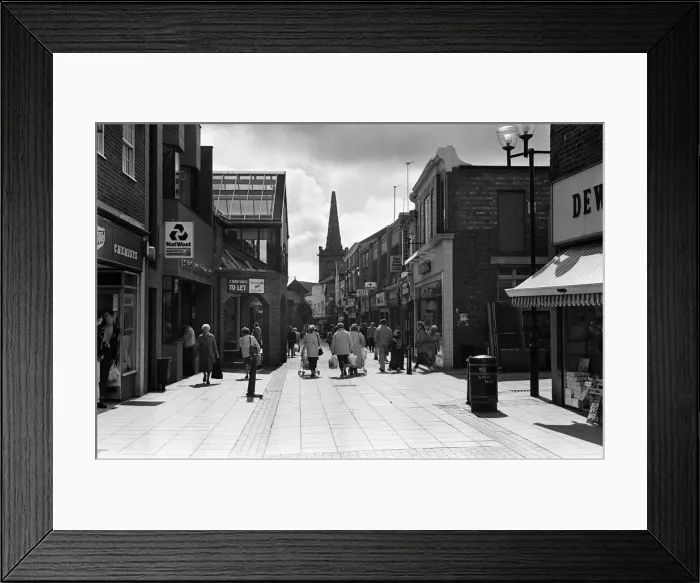 Framed Print : Eccleston Street Prescot, Merseyside, which has seen the arrival of a new shopping mall Framed Print : Eccleston Street Prescot, Merseyside, which has seen the arrival of a new shopping mall