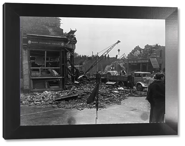 Damage to a residential street in Stepney caused when an enemy aircraft crashed