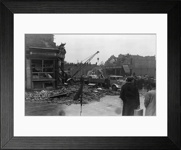 Framed Print : Damage to a residential street in Stepney caused when an enemy aircraft crashed Framed Print : Damage to a residential street in Stepney caused when an enemy aircraft crashed