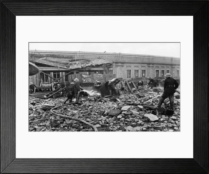 Framed Print : Firemen tackle a blaze near Waterloo Station where a store of phosphorous bombs was set Framed Print : Firemen tackle a blaze near Waterloo Station where a store of phosphorous bombs was set