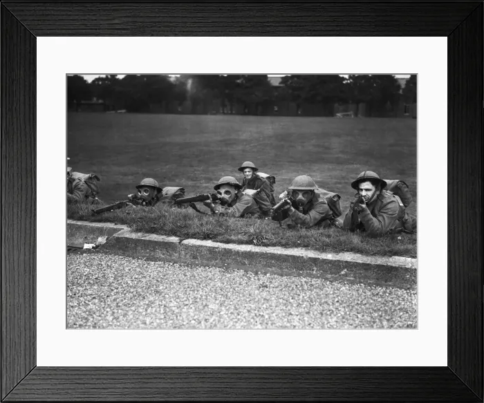 Framed Print : Home Guard taking rifle practice during a mock gas attack. Circa 1941 Framed Print : Home Guard taking rifle practice during a mock gas attack. Circa 1941