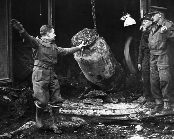 Removing a 1 ton bomb from Brixton Hill in South London after an air raid during