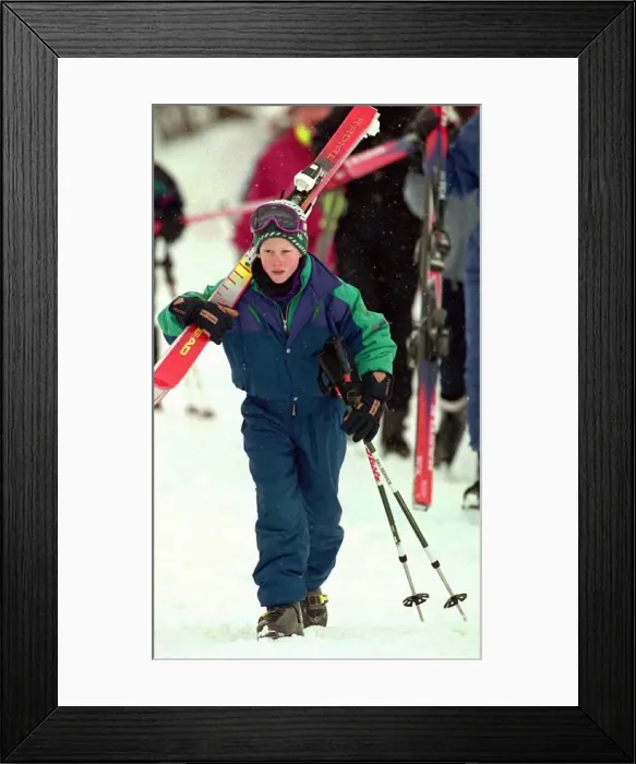 Framed Print : PRINCE HARRY STANDING IN THE SNOW HOLDING HIS SKIS DURING HIS HOLIDAY IN LECH