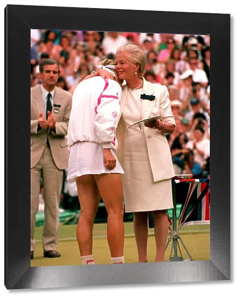JANA NOVOTNA ON COURT BEING COMFORTED BY THE DUCHESS OF KENT AS SHE IS AWARDED WITH HER