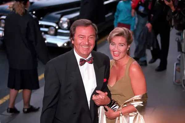 DES O CONNOR AND HIS GIRLFRIEND JAY RUFER ARRIVING AT THE PREMIERE OF SUNSET