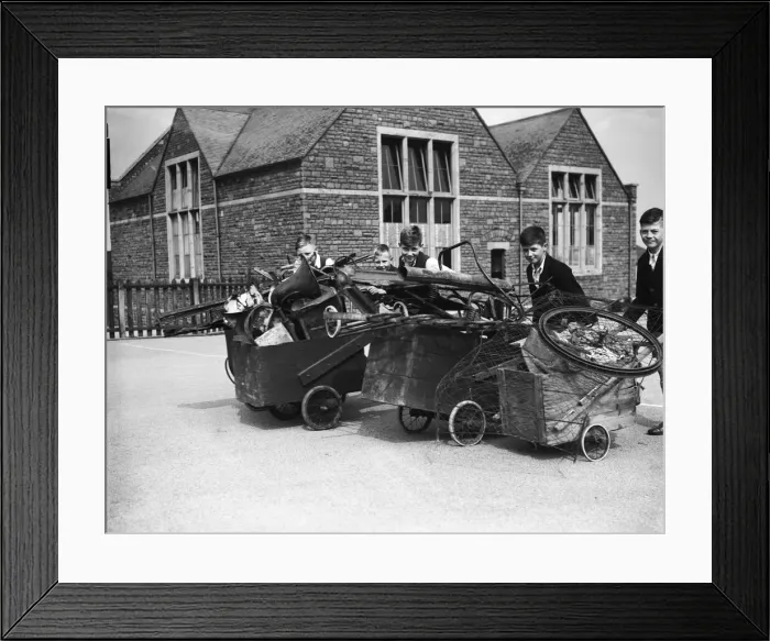 Framed Print : Bristol schoolchildren seen here collecting scrap metal during the Second World War Framed Print : Bristol schoolchildren seen here collecting scrap metal during the Second World War