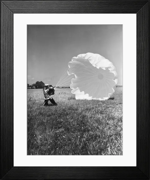 Framed Print : Fleet Air Arm parachute packers seen here testing a parachute at an un-named Royal Naval Framed Print : Fleet Air Arm parachute packers seen here testing a parachute at an un-named Royal Naval