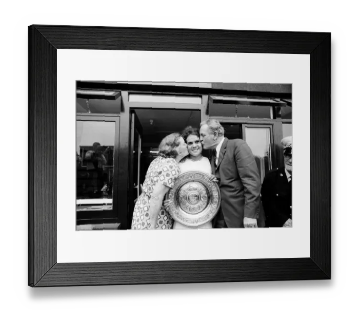Framed Print : 1971 Wimbledon Ladies Singles Final. Champion Evonne Goolagong gets a kiss from her Framed Print : 1971 Wimbledon Ladies Singles Final. Champion Evonne Goolagong gets a kiss from her