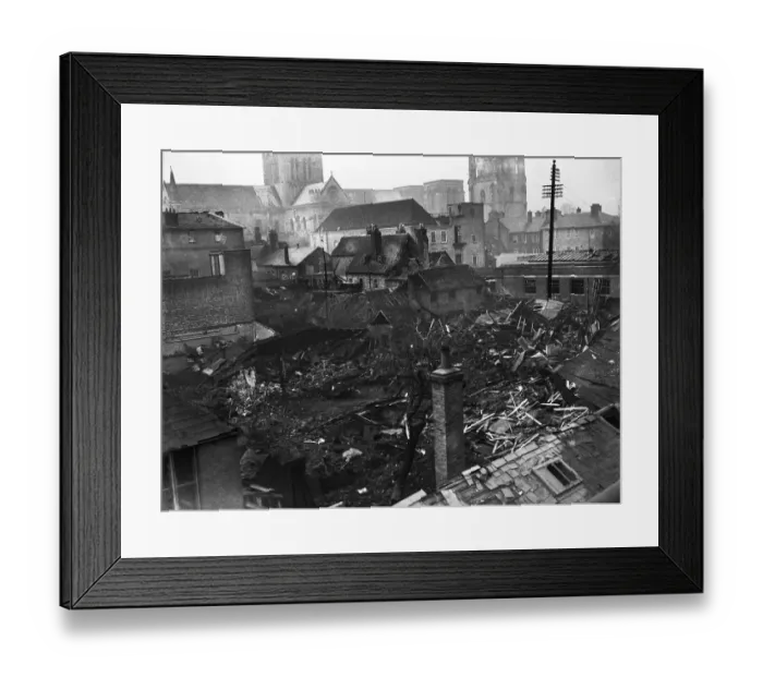 Framed Print : Bomb damage to Chichester following a tip and run raid on the city by Luftwaffe fighter