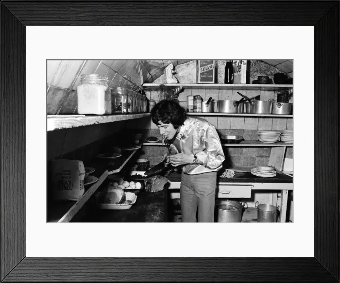 Framed Print : 18-year-old Cat Stevens in the kitchen of his Dads restaurant in Shaftesbury Avenue