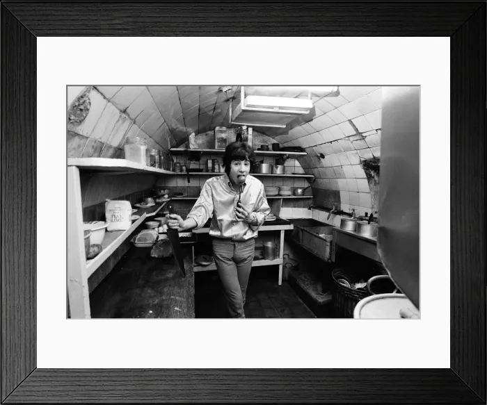 Framed Print : 18-year-old Cat Stevens in the kitchen of his Dads restaurant in Shaftesbury Avenue