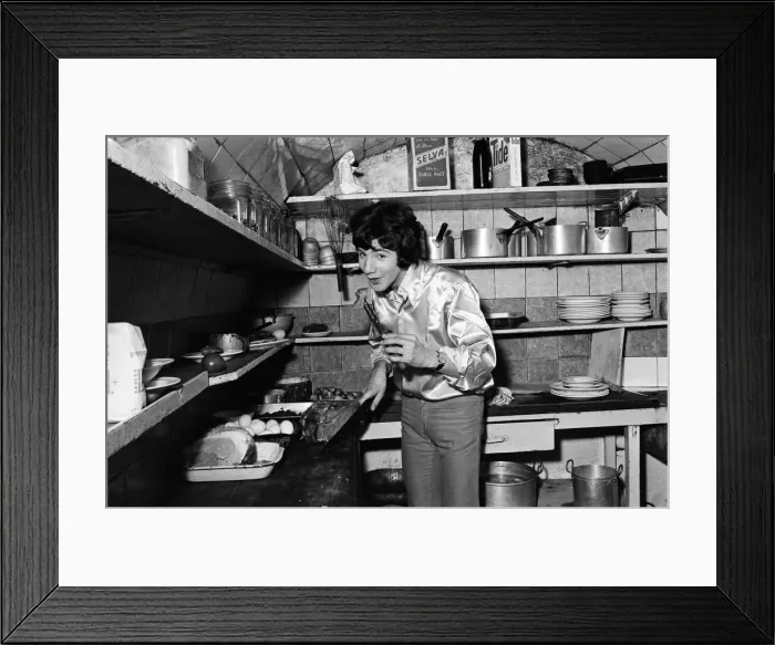 Framed Print : 18-year-old Cat Stevens in the kitchen of his Dads restaurant in Shaftesbury Avenue
