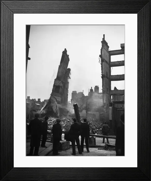 Framed Print : Onlookers watch as unsafe buildings in Fetter Lane, London are demolished following