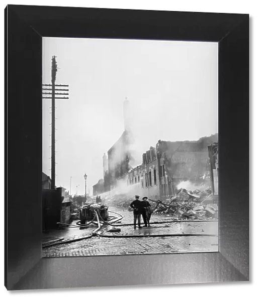Bomb damage to Comet Radio showrooms in George Street, Hull. 23 March 1941